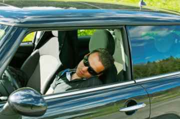 Man Sleeps In A Car, David Castillo Dominici / www.freedigitalphotos.net 